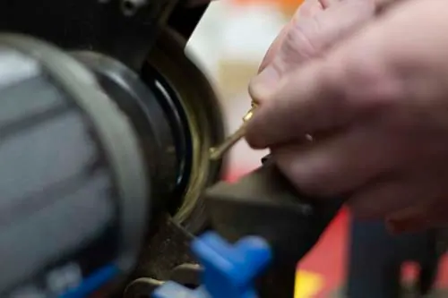 Cutting a key by hand at the shop