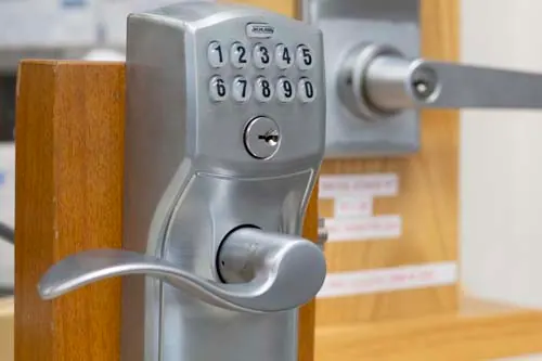 Keypad entry lever lock on a display door